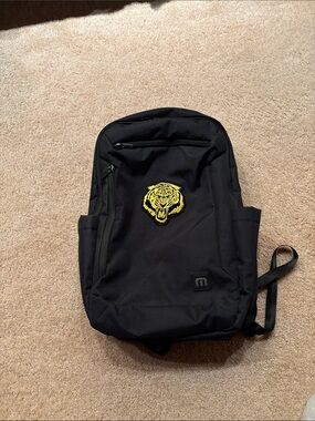 Brand New w/tags - Travis Mathew  black Duration backpack w/ yellow Tiger Patch